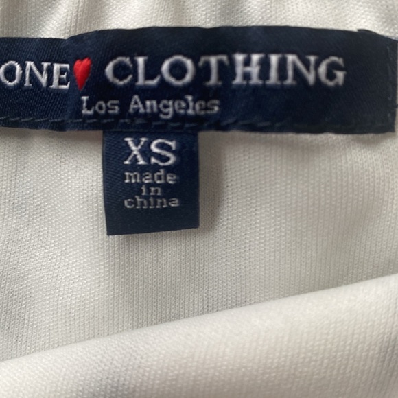 One Clothing: White Jumpsuit Romper with Black and Maroon Pattern Stripes - Picture 12 of 17